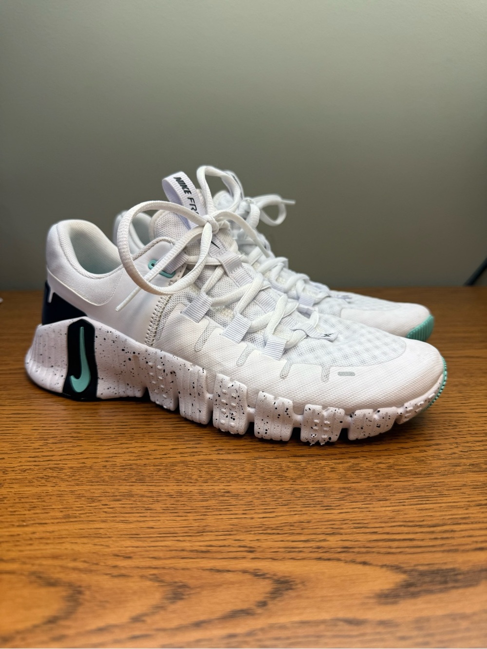 Nike Women’s White Athletic Shoes with Teal Accent